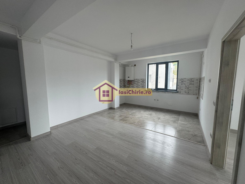 Apartament de vanzare cu 3 camere in Iasi, de tip semidecomandat, suprafata de 58 mp, zona Bucium
